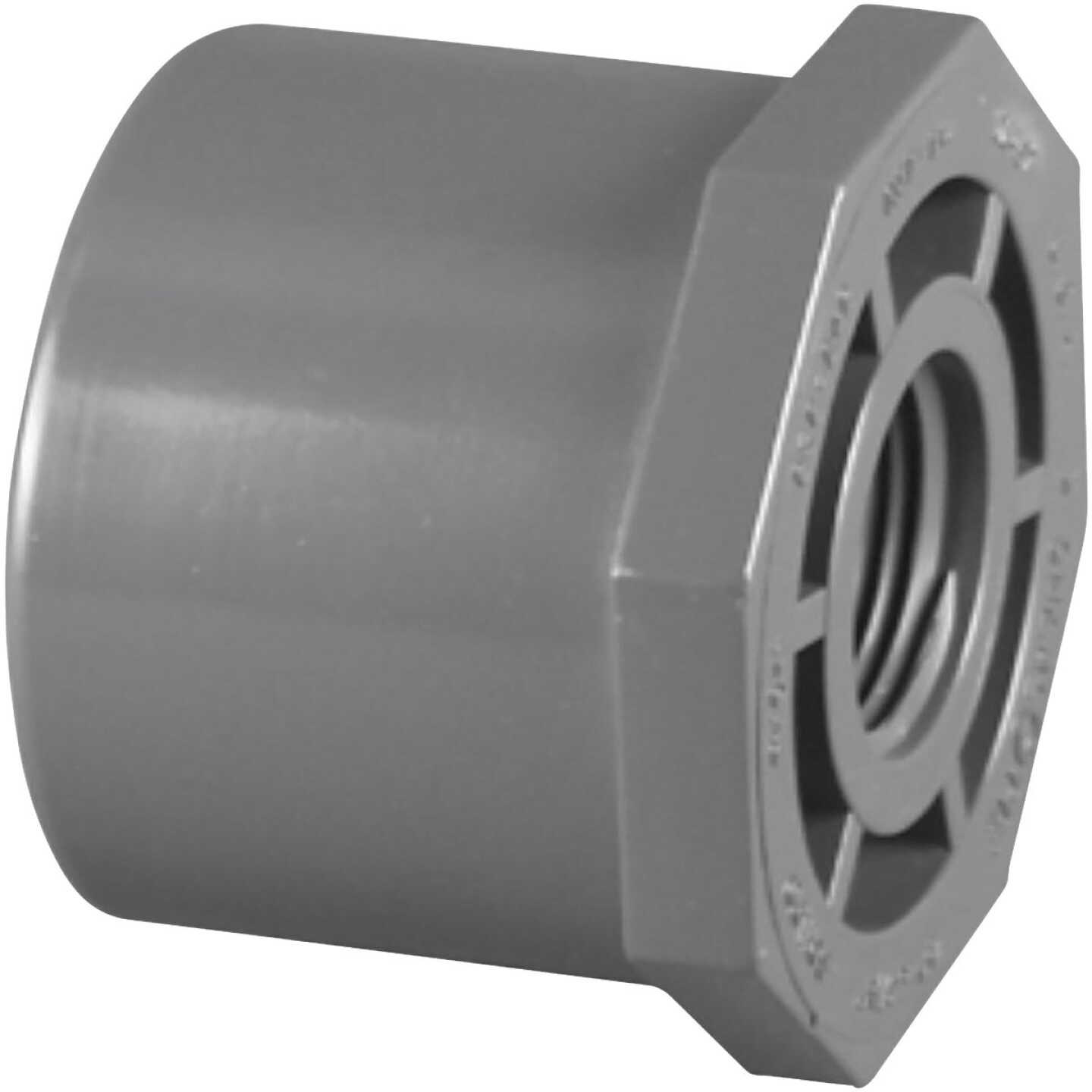 Charlotte Pipe 1-1/4 In. Spigot x 3/4 In. FIP Schedule 80 Reducing PVC Bushing Image 1