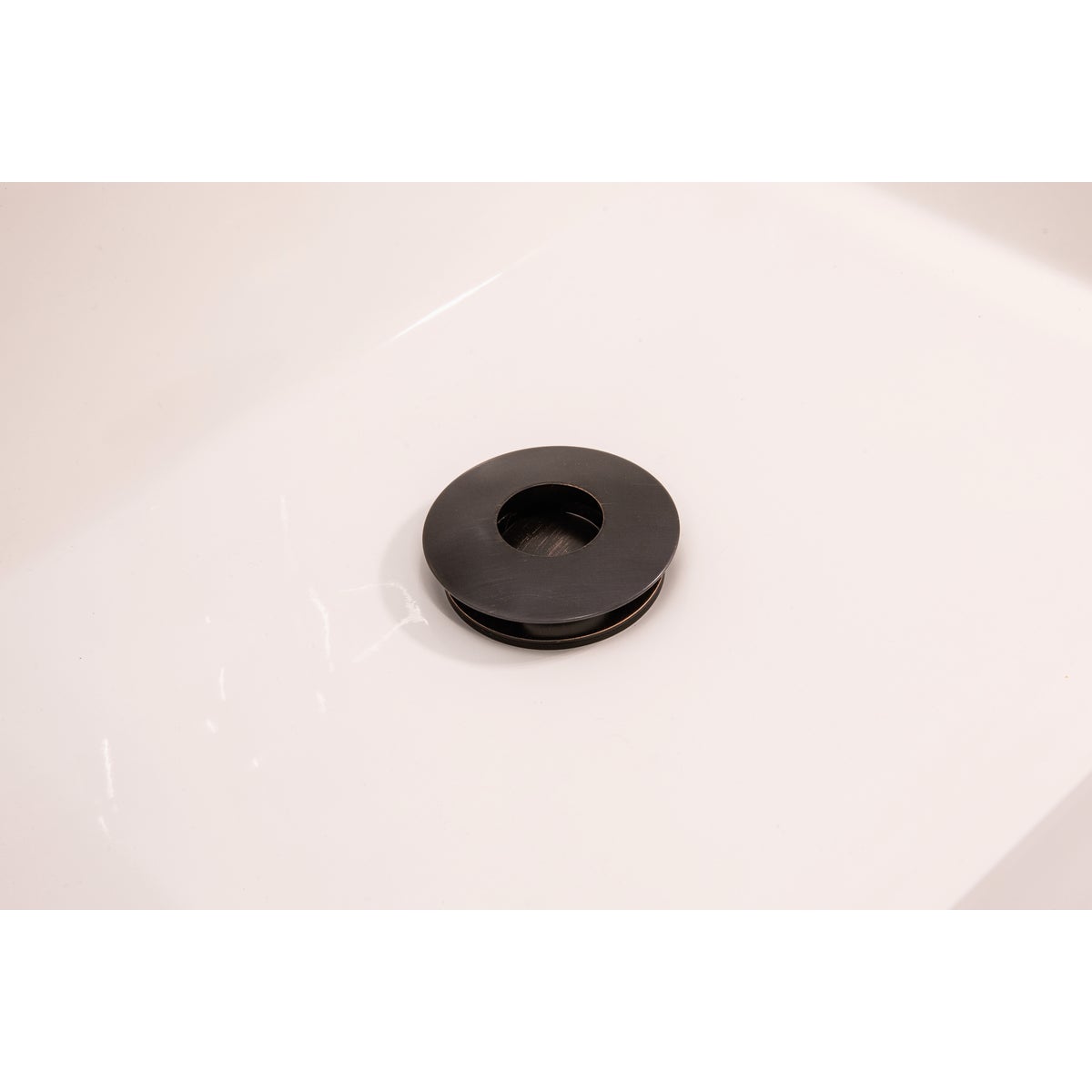 Keeney 1-1/4 In. Bronze Finished Brass Push Button Universal Bathroom Sink Drain Stopper Image 2