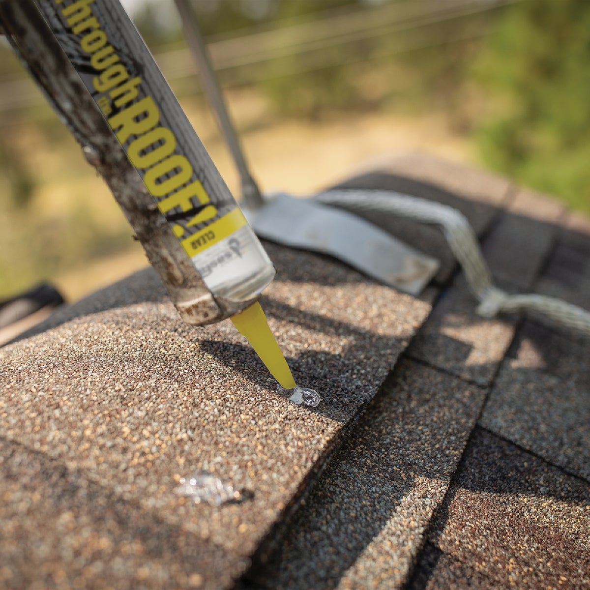 Through the Roof! 10.5 Oz. Black Roof Sealant Image 4